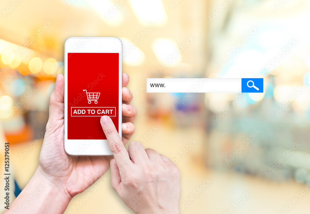 Aufkleber Hand holding mobile  with Add to cart button and empty screen fo