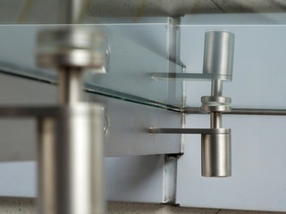 Glass fittings for frameless glass facades and walls.