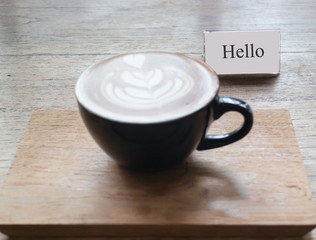 Hot cup of latte art coffee