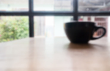 Hot cup of coffee on wooden table