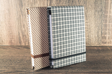 Handmade notepad decorated with fabric used for writing reminders of your life or business.