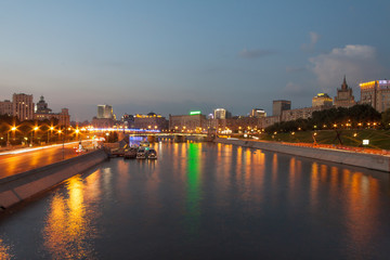 Fototapeta na wymiar View on the Moscow river, Berezhkovskaya and Rostovskaya embankments in the evening, summer urban cityscape