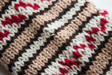 Handmade knitted pattern closeup