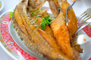 Fried snapper topped with sweet fish sauce