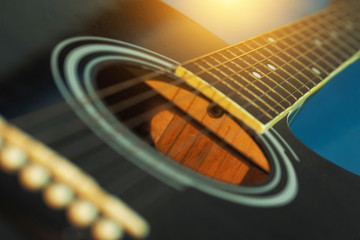 Obraz premium Acoustic guitar with very shallow depth