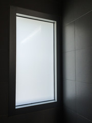 Light through window at modrn restroom(toilet)