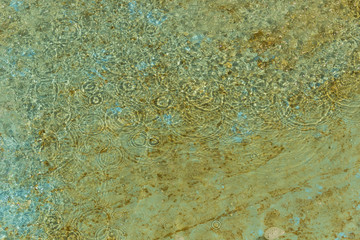 Drop's reflection. Drops in a water fountain.