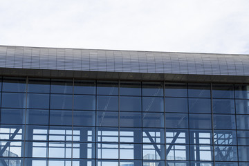 Modern office building  from low perspective with blue sky in the background.