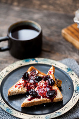 Toast with butter and sour cherry jam