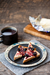 Toast with butter and sour cherry jam