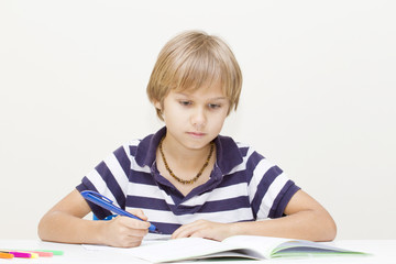 Child at home doing homework