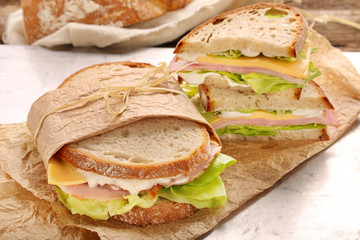 Fresh sandwich with ham cheese and lettuce