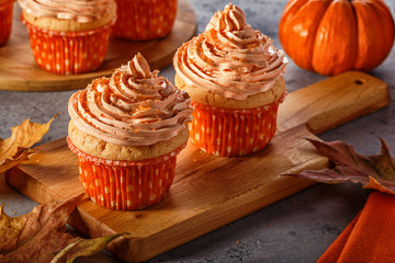 Pumpkin cupcakes with glitter sugar sprinkles.