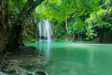 Fototapeta na wymiar Green and clean waterfall for relaxation, Erawan waterfall , Located Kanchanaburi, Thailand