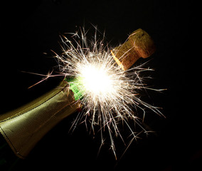 New Year's fireworks sparks from the bottle chmpagne