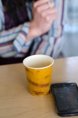 girl drinking cofee in a cafe