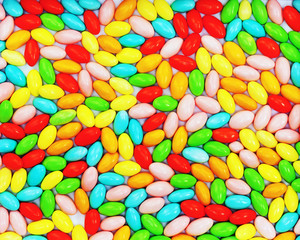 Fototapeta na wymiar Multi colored candies for use as background. Closeup.
