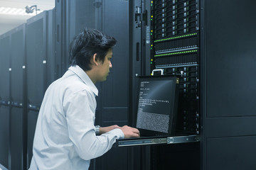 Administrator working in data center