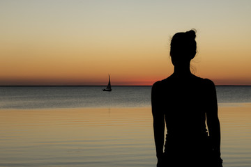 Beautiful girl silhouette on the sunset, Mozambique  