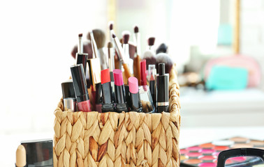 Set of decorative cosmetics on light background