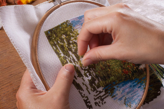 The process of working on embroidery