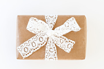 gift box with a white ribbon and bow isolated