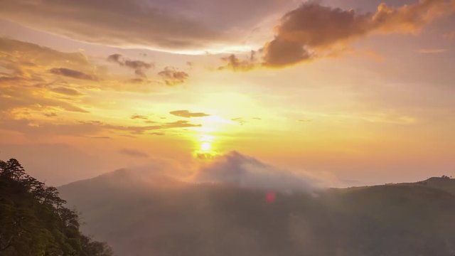 4K timelapse of sunset with cloud flowing on mountain in Thailand