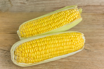 two corn on wood table