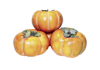 Obraz premium Juicy orange persimmon fruit isolated