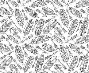 Vector seamless pattern with ornate tribal feathers