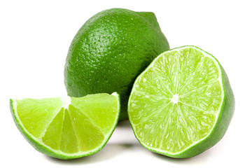 lime with slices and half isolated on white background