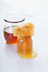 Jar of honey and honeycomb
