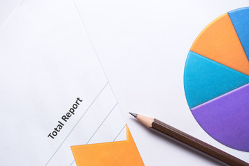 Office work space with paper chart and office accessories