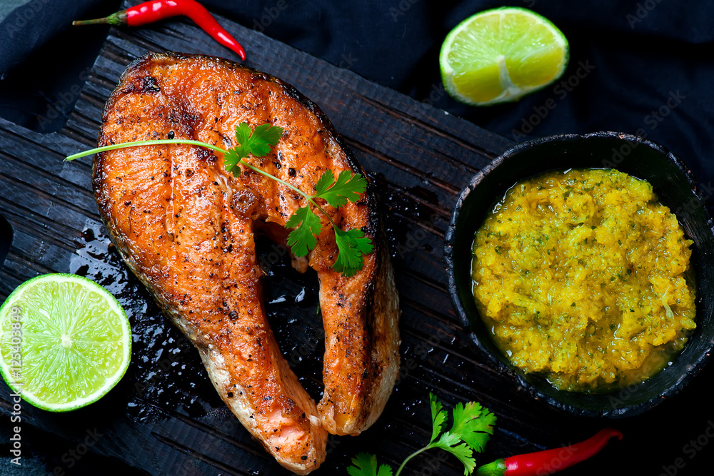 Wall mural grilled salmon steaks with mango dip