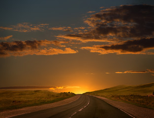 sunset over the country highway