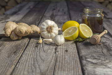 Alternative Medicine with Lemon, Ginger, honey and Garlic.