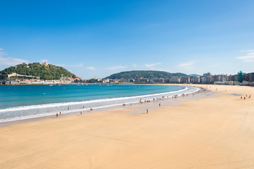 The Beach of La Concha Donostia, a sand beach with shallow waters and tide. It is one of the most famous urban beaches in Europe. Donostia San Sebastian is European Capital of Culture 2016