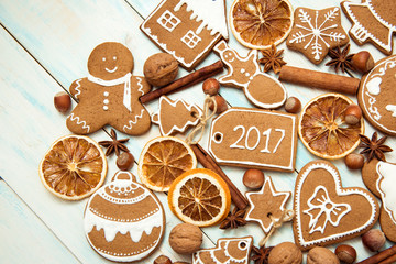 Holidays Christmas and new year. Set the gingerbread on a light wooden background