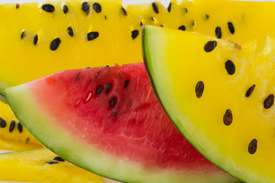 Sliced yellow and red watermelon closeup