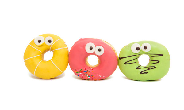 delicious donuts in color glaze