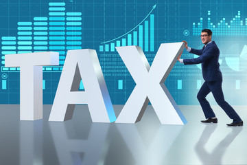 Businessman in high taxes concept