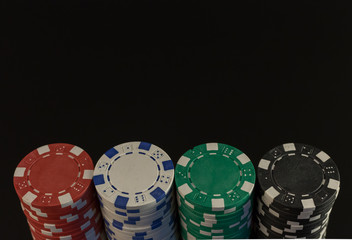 Casino chips on black
