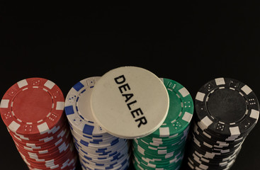 Casino chips on black