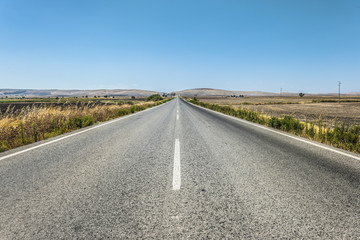 Long asphalt road.