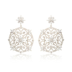 Pair of silver diamond earrings isolated on white