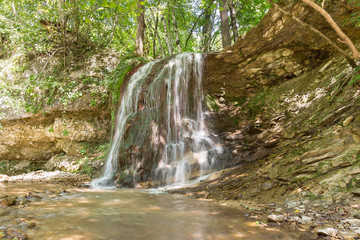 Waterfall in the forest. Russia, Krasnodar Krai