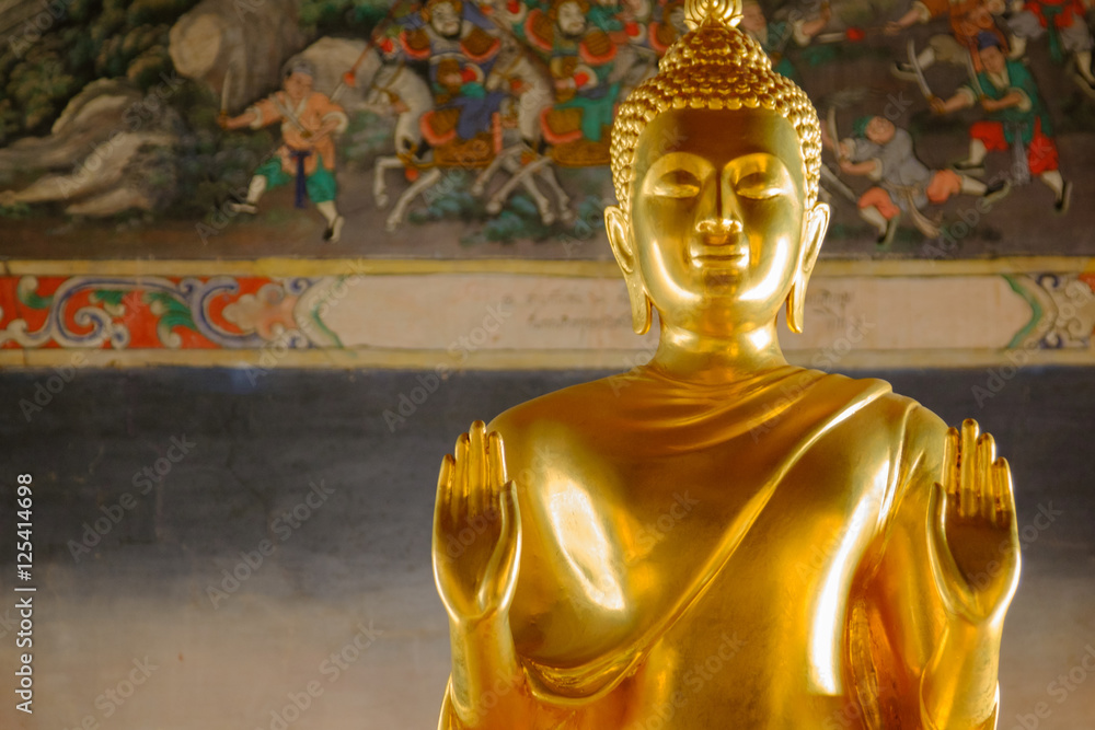 Wall mural beautiful of golden buddha statue and thai art architecture in wat bovoranives, bangkok, thailand. p