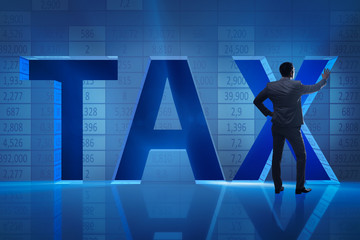 Businessman in high taxes concept