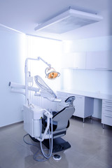 Modern dental practice. Dental chair and other accessories used