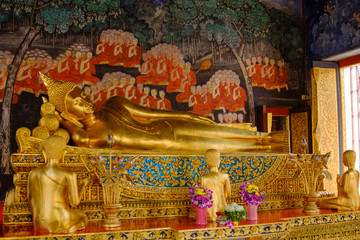 Reclining Buddha gold statue and thai art architecture in Wat Bovoranives, Bangkok, Thailand. Photo taken on: October 30, 2016 ..